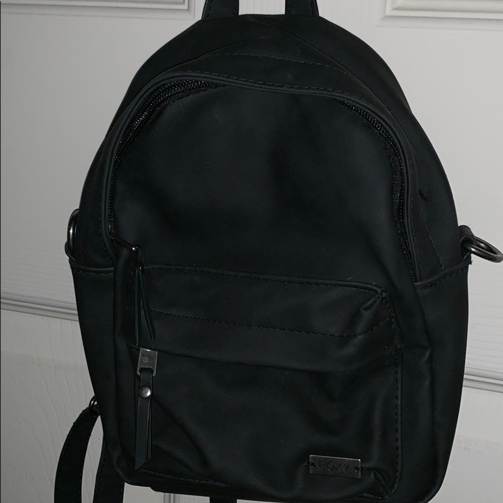 Roxy mini backpack can convert to a cross body